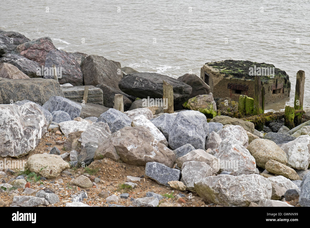 Wartime pillbox a victim of coastal erosion hires stock photography