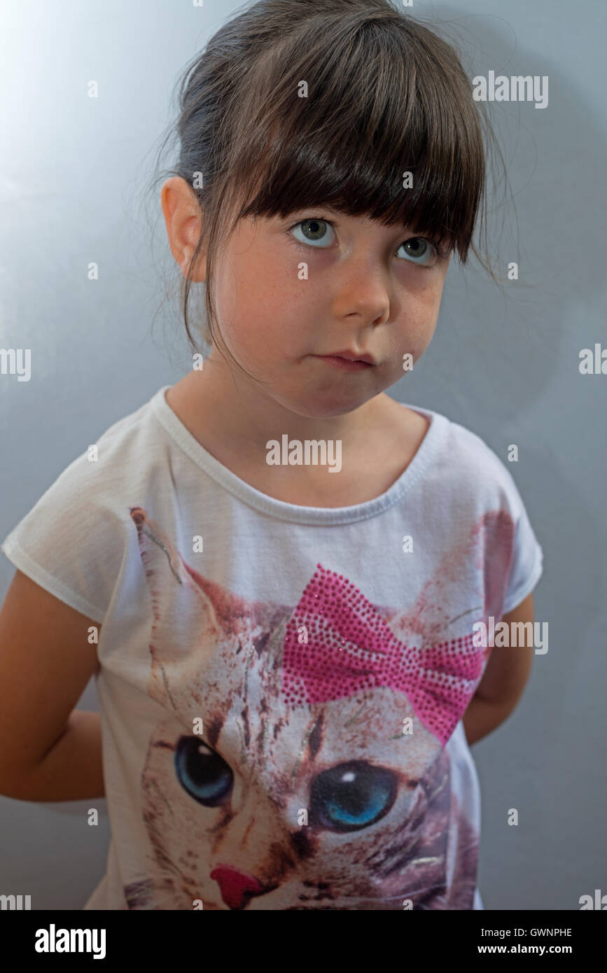 4-year old girl reacting to being told off Stock Photo