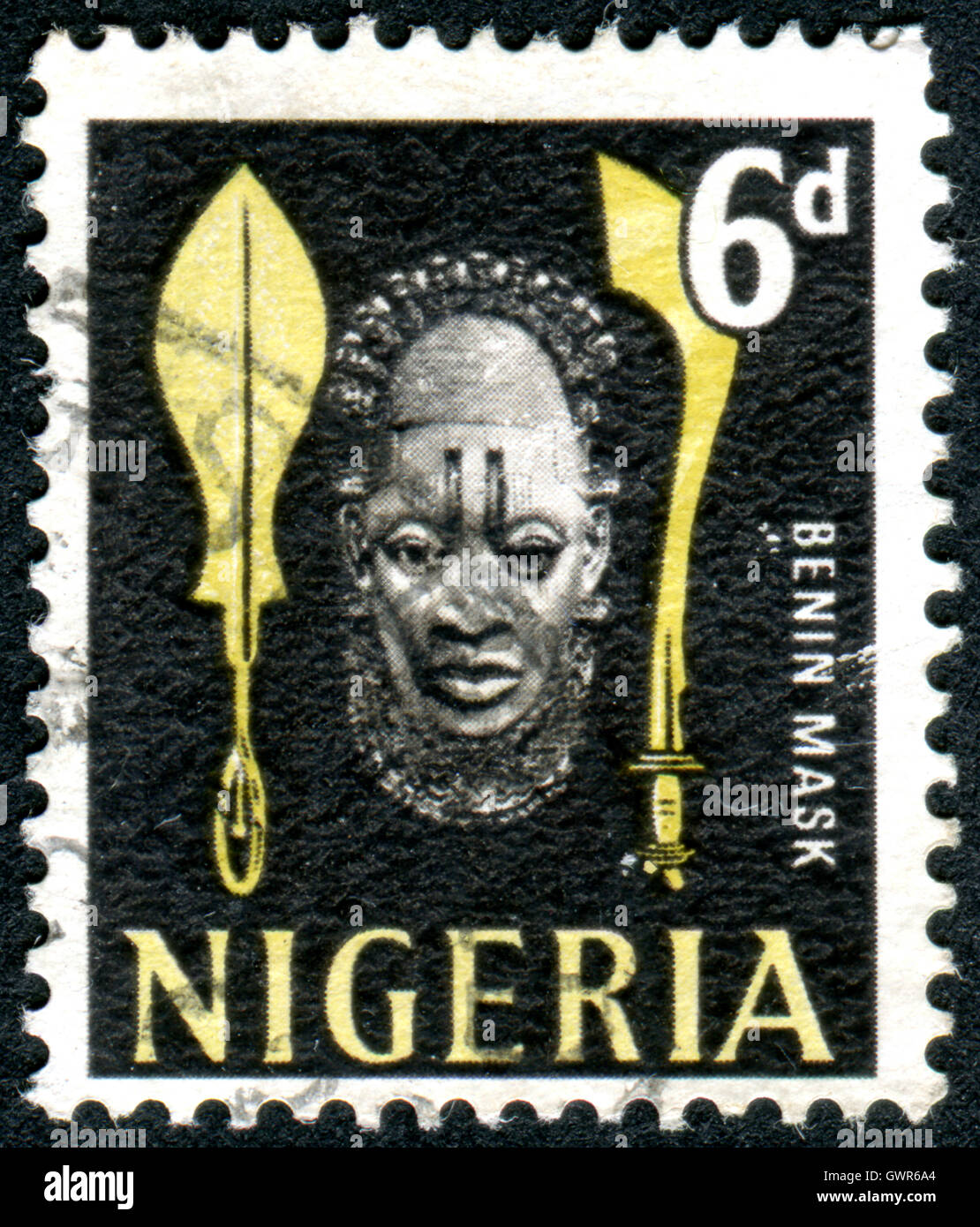 NIGERIA - CIRCA 1961: Postage stamp printed in the Nigeria, depicted Benin Pendant Mask, circa 1961 Stock Photo