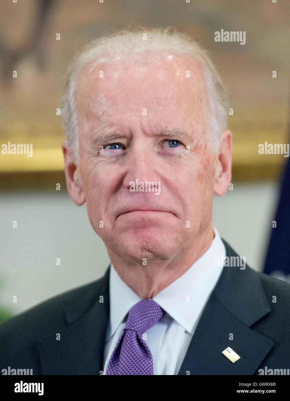 United States Vice President Joe Biden looks on as US President Barack Obama announces he will keep 5,500 US troops in Afghanistan when he leaves office in 2017 and explains his reasoning for that action in the Roosevelt Room of the White House in Washing Stock Photo