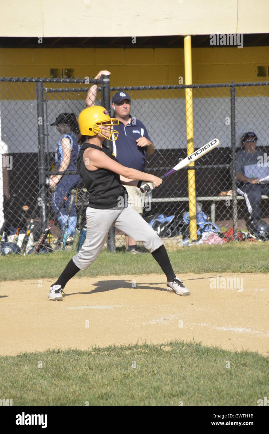 Batter in a softball game Stock Photo Alamy