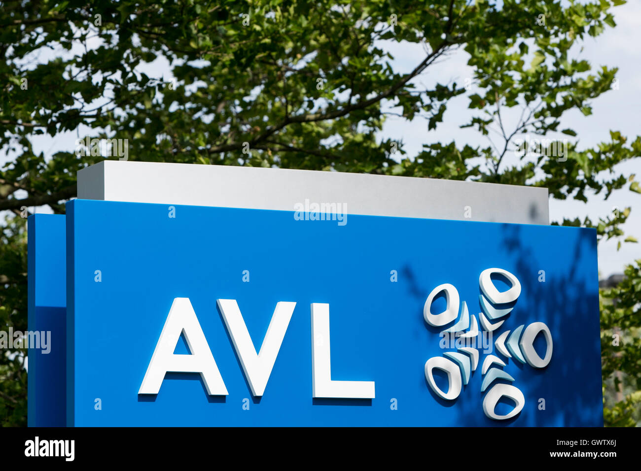 A logo sign outside of a facility occupied by Anstalt für Verbrennungskraftmaschinen List (AVL), in Plymouth, Michigan on July 1 Stock Photo