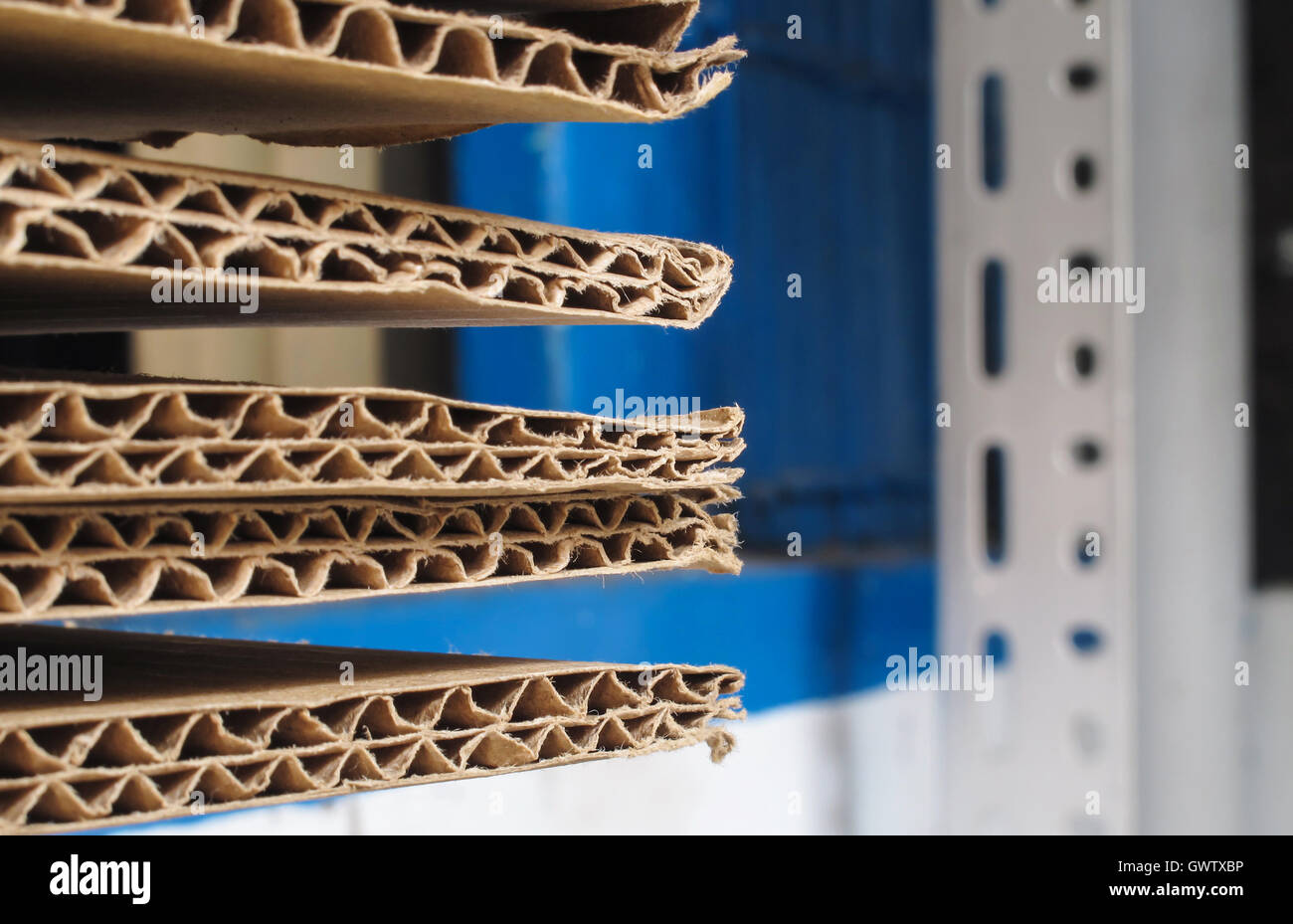 Stack of used brown corrugated cardboard sheet Stock Photo Alamy