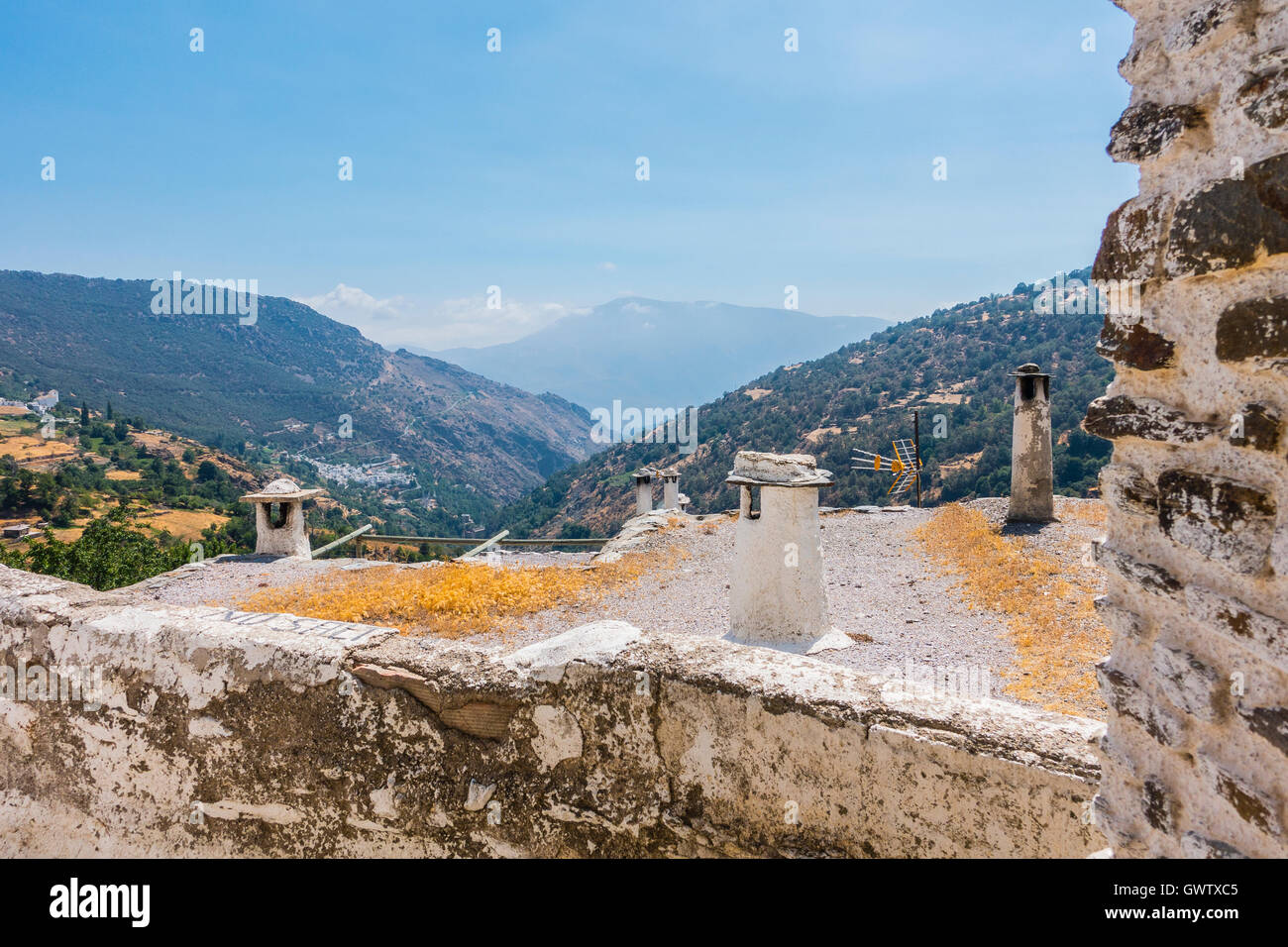 Unique chimneys of Capileira, Spain, a "white village Stock Photo Alamy