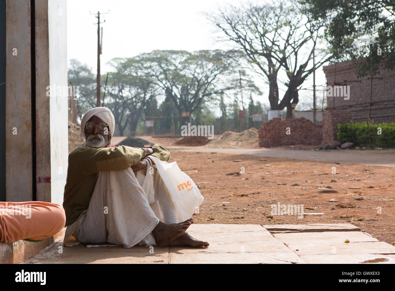 Old Indian man immersed in thoughts Stock Photo