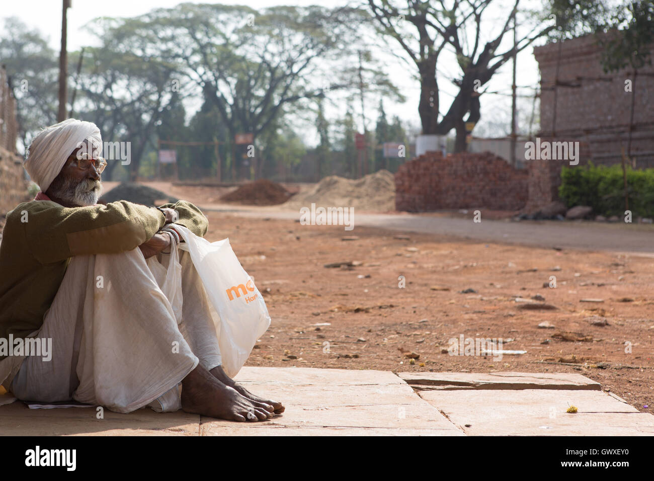 Old Indian man immersed in thoughts Stock Photo