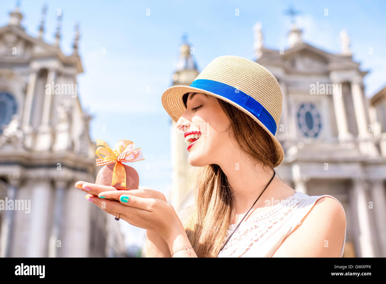 Woman with chocolate in Turin city Stock Photo