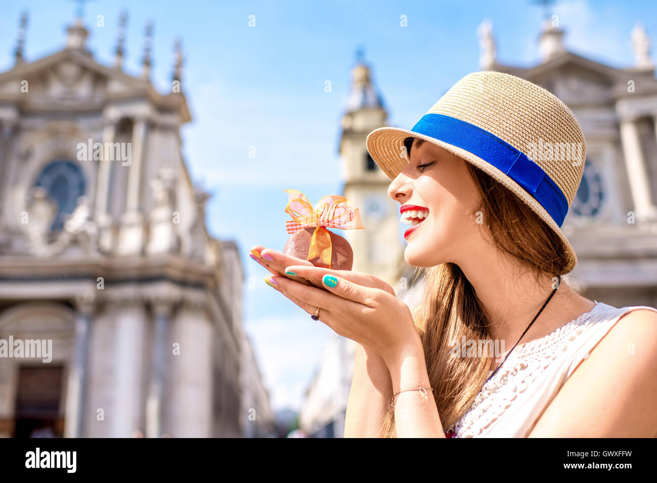 Woman with chocolate in Turin city Stock Photo