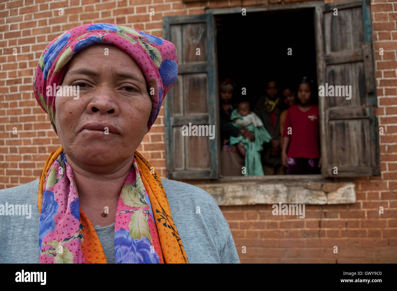 Albino mother. In the background, her four children and one grand child ( Madagascar) Stock Photo