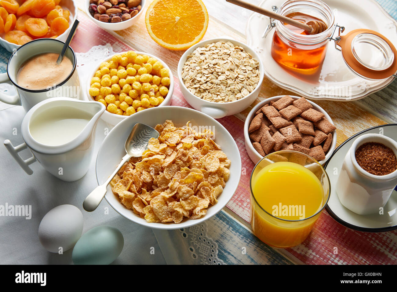 Breakfast healthy cereal coffee and orange juice and eggs Stock Photo
