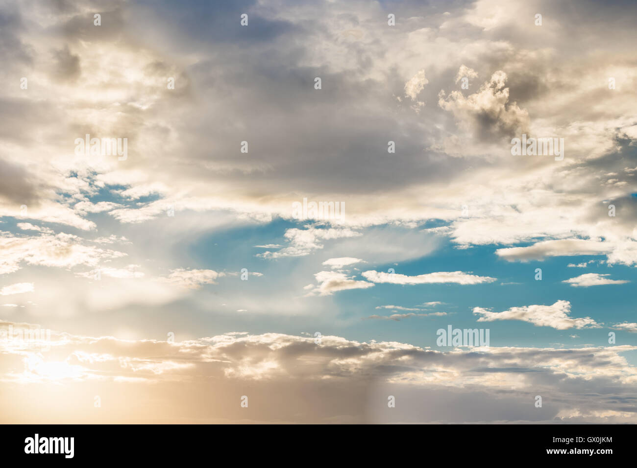 Blue cloudy sky sunset hi-res stock photography and images - Alamy