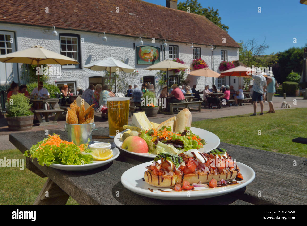 Pub lunch at the Tiger Inn, East Dean, East Sussex, England Stock Photo