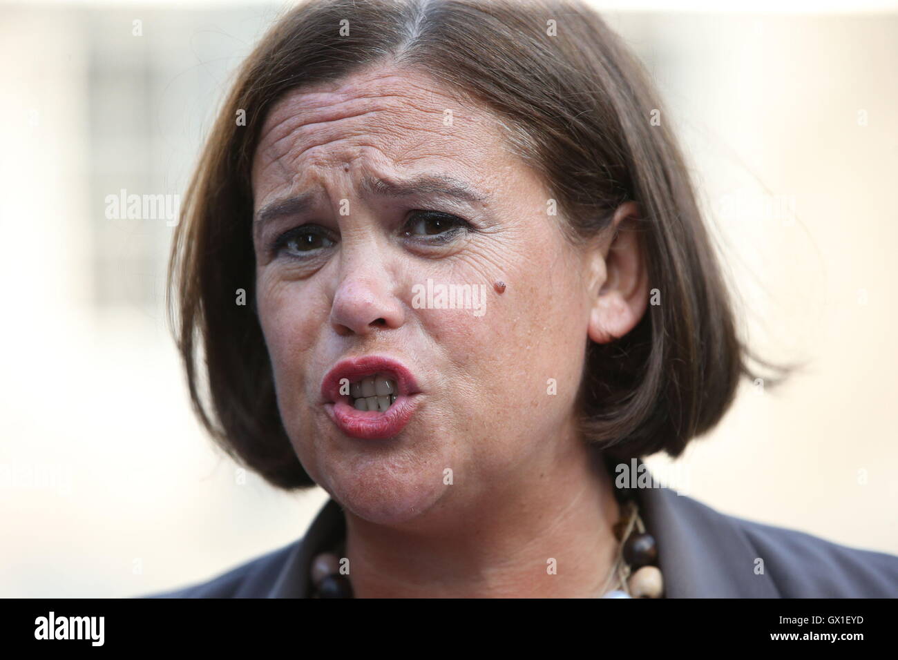 Sinn FÂŽin Deputy Leader Mary Lou McDonald speaks in response to the Nama report, as the Irish government is to order an inquiry into the controversial &pound;1.2 billion sale of Northern Ireland property assets by bad bank Nama, outside Government buildings in Dublin. Stock Photo