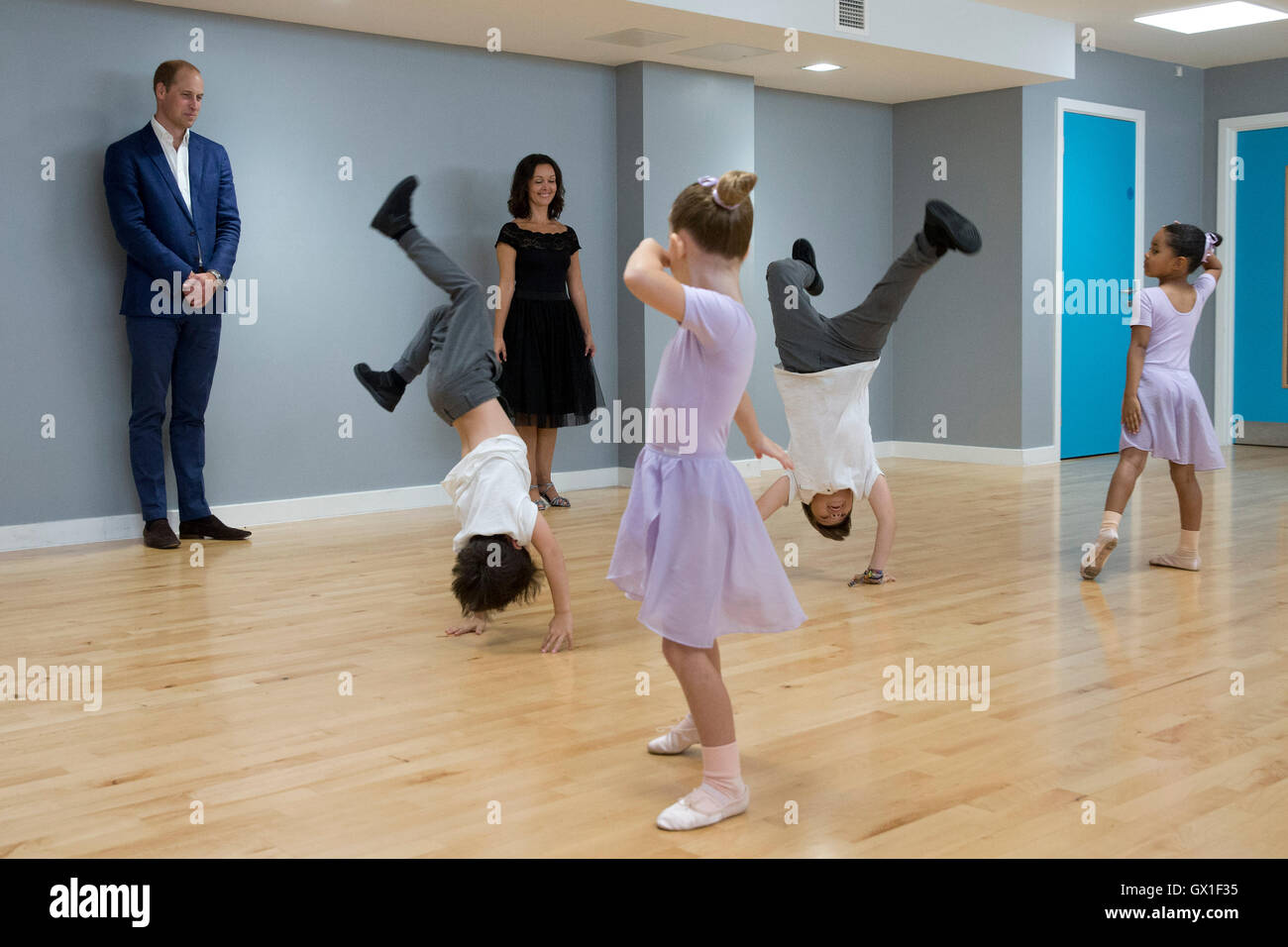 The Duke of Cambridge watches young dancers during a visit to Caius House youth centre, London. Stock Photo