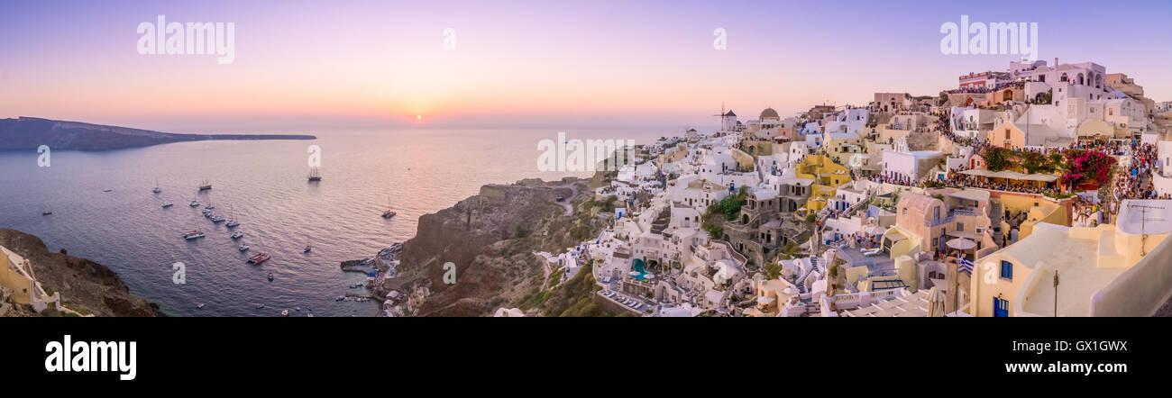 Waiting for the sunset in the village of Oia in the Santorini, Greece. Santorini is an ancient volcano located in the middle of  Stock Photo
