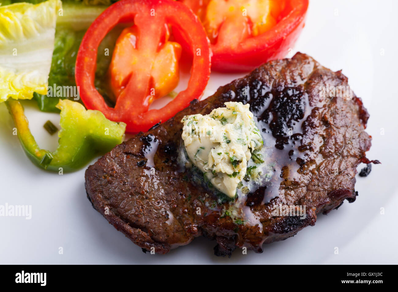 Steak mit Kr∩┐╜uterbutter Stock Photo