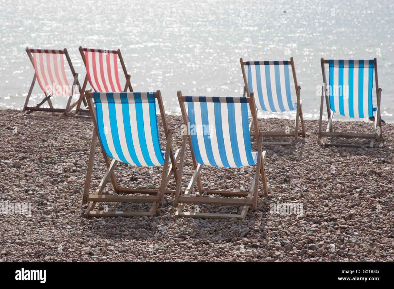 Brighton seafront deck chairs hi-res stock photography and images - Alamy