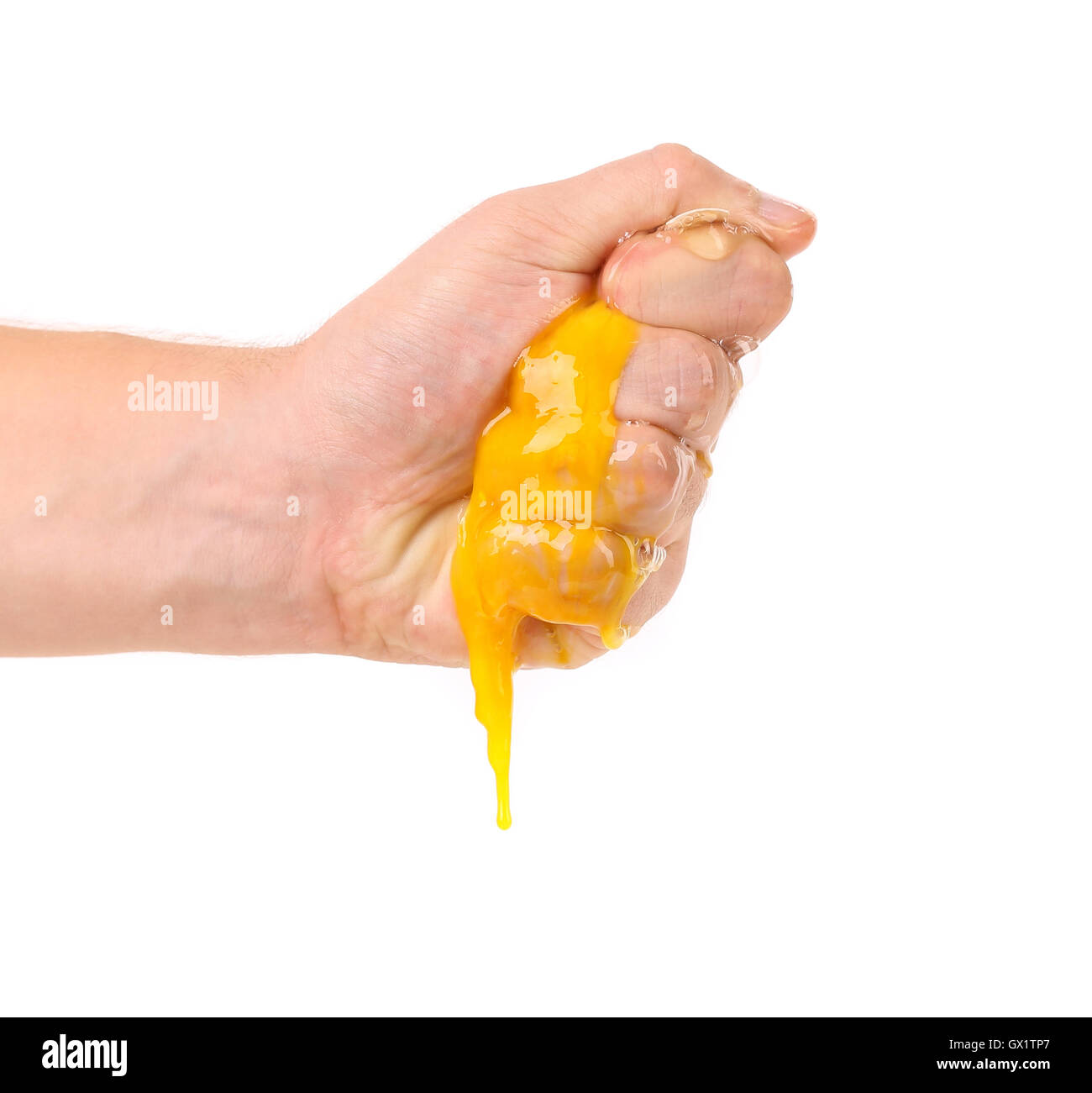 Hand smash egg yolk Stock Photo Alamy