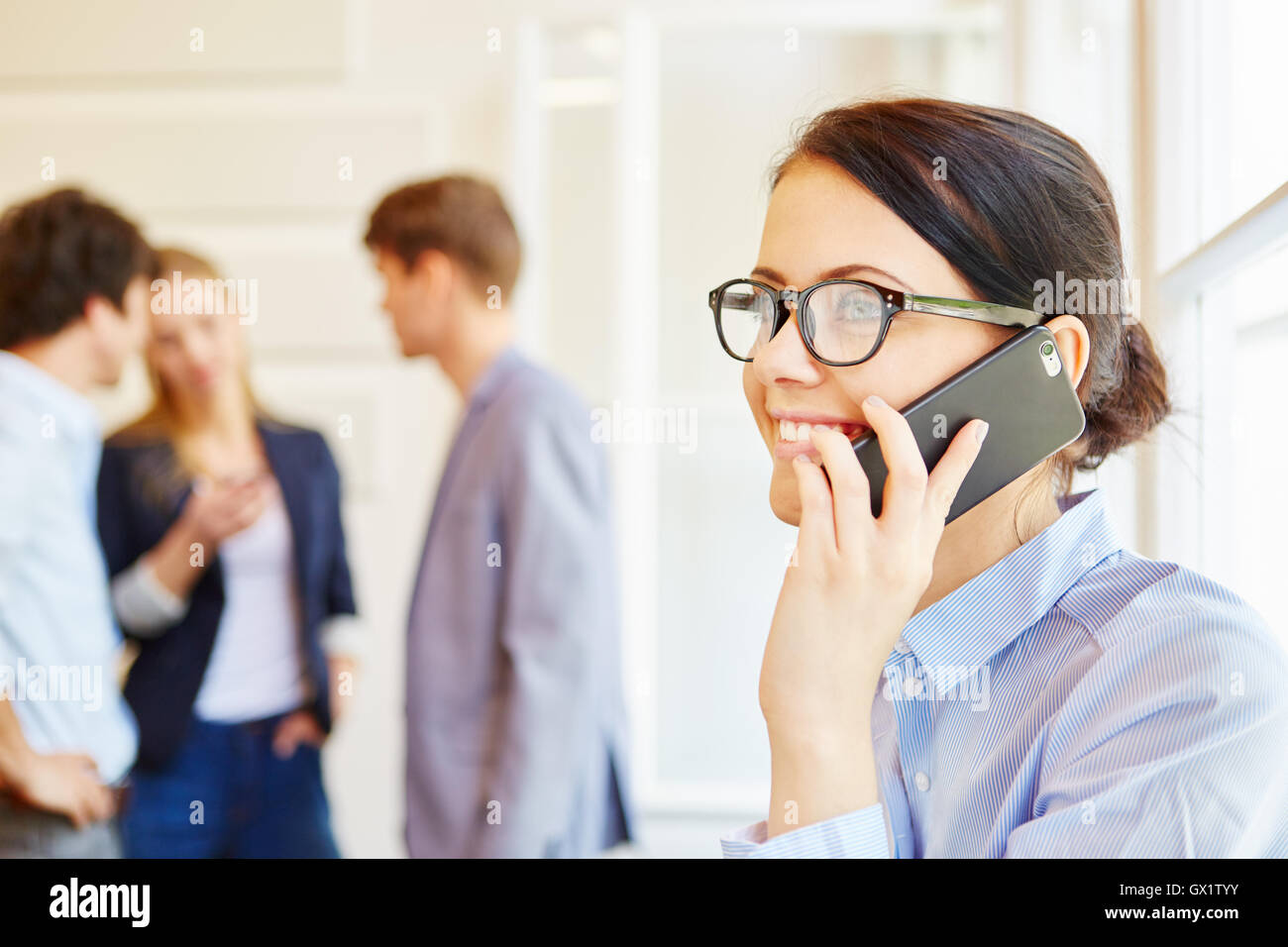 Businesswoman calling with smarthphone as communication concept Stock Photo