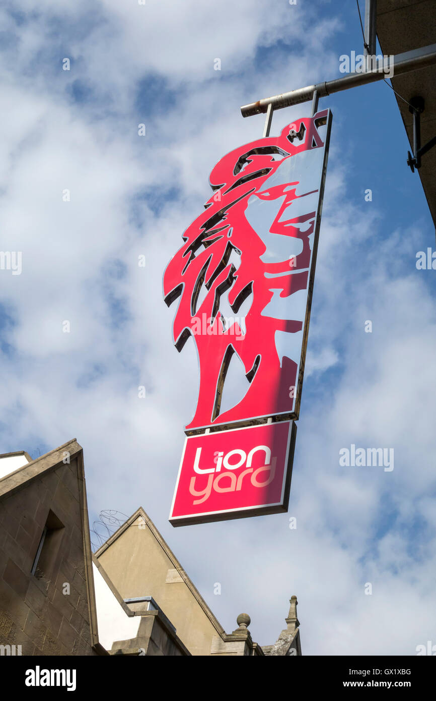 Lion yard sign against sky in Petty Cury Cambridge City Cambridgeshire England 2016 Stock Photo