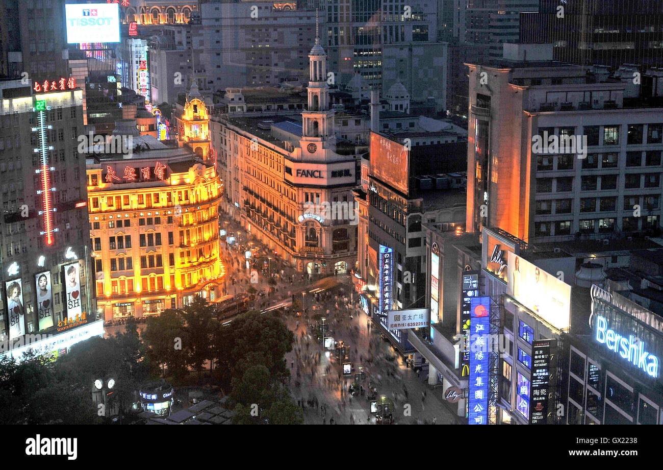 aerial view on business district by night  Nanjing Lu Shanghai China Stock Photo