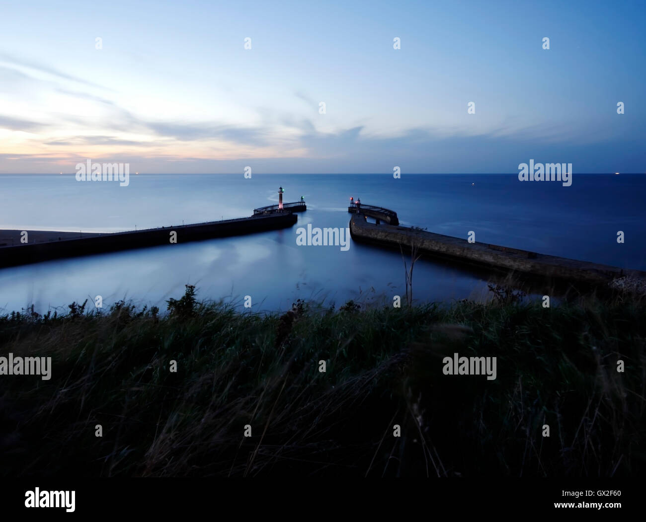 Whitby harbour at night Esk Valley North Yorkshire Moors England United Kingdom UK Great Britain GB Steam heritage diesel trains Stock Photo