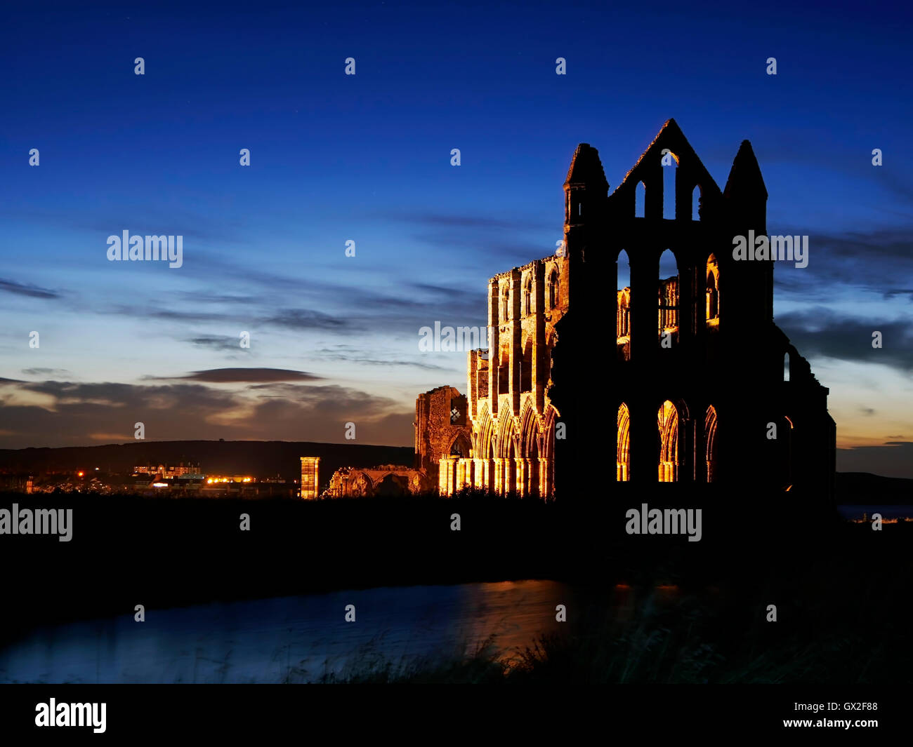 Whitby Abbey at night Esk Valley North Yorkshire Moors England United Kingdom UK Great Britain GB Steam & heritage diesel trains Stock Photo