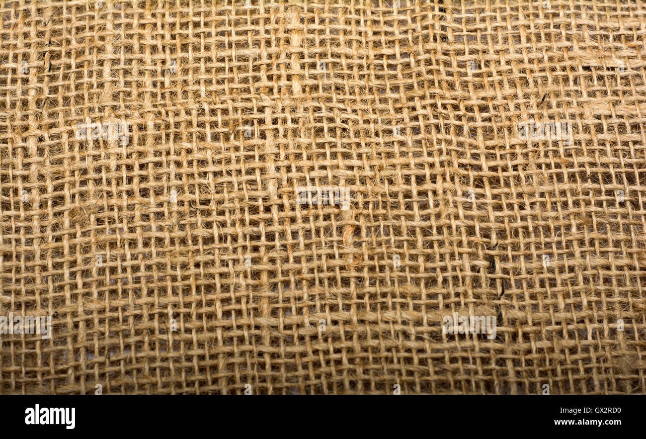 Dark background hessian sacking jute background Stock Photo - Alamy