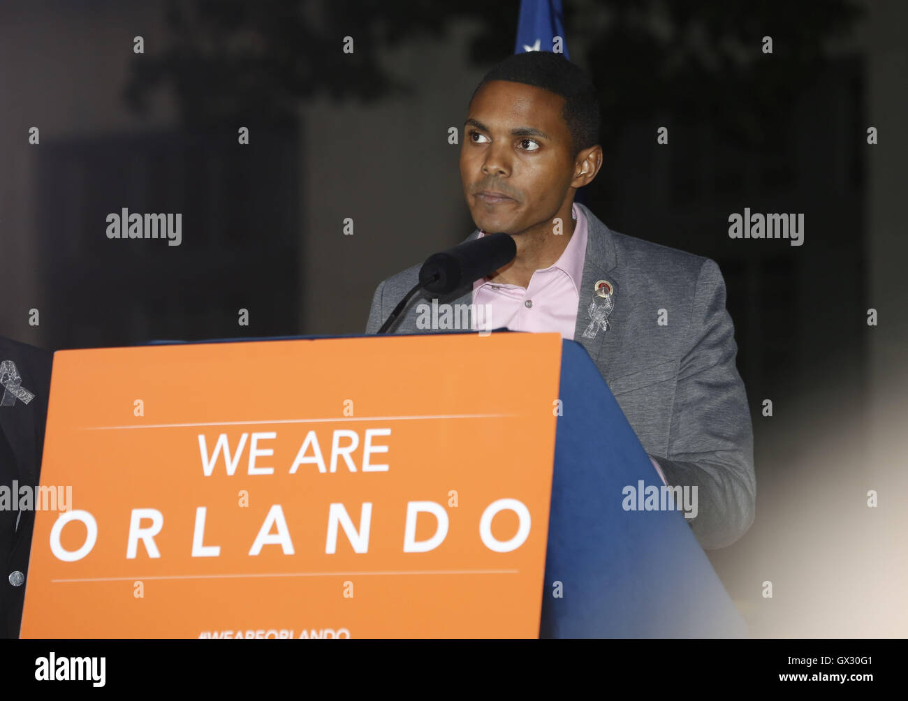 Crowds of people gather at Stonewall Place in New York City to pay tribute to the victims of the