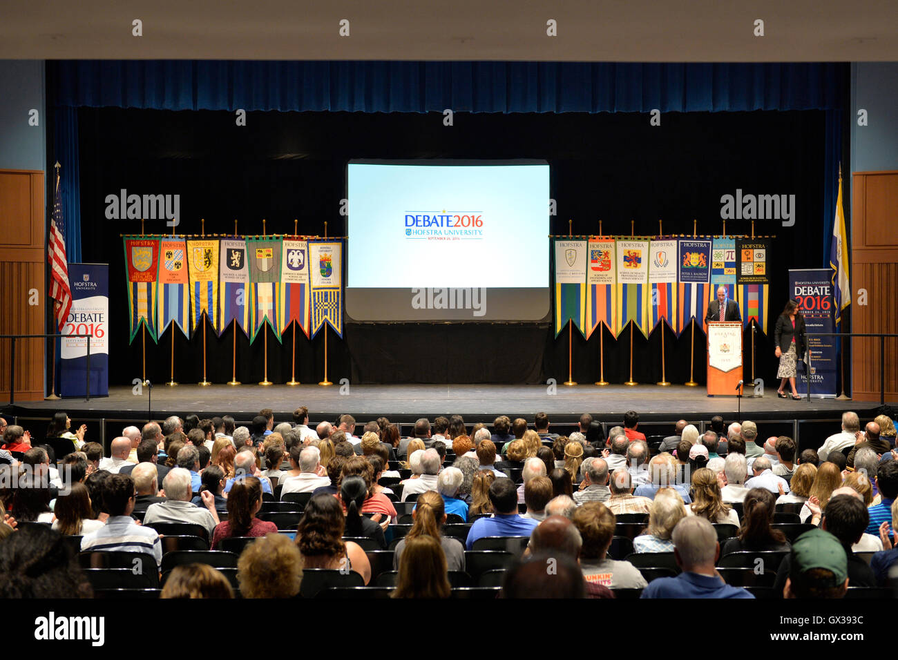 Hempstead, New York, USA. September 13, 2016. Dr. MEENA BOSE, moderator and Hofstra political science professor, leaves stage after introducing DAVID AXELROD - CNN Senior Political Commentator and Democratic strategist who served as Obama Senior Advisor - the Signature Debate Speaker on The Evolving Media and Political Landscape, at Hofstra University, which will host the 1st Presidential Debate, between H.R. Clinton and D. J. Trump, scheduled for later that month on September 26. Hofstra is 1st university ever to host 3 consecutive U.S. presidential debates. Credit:  Ann E Parry/Alamy Live Ne Stock Photo