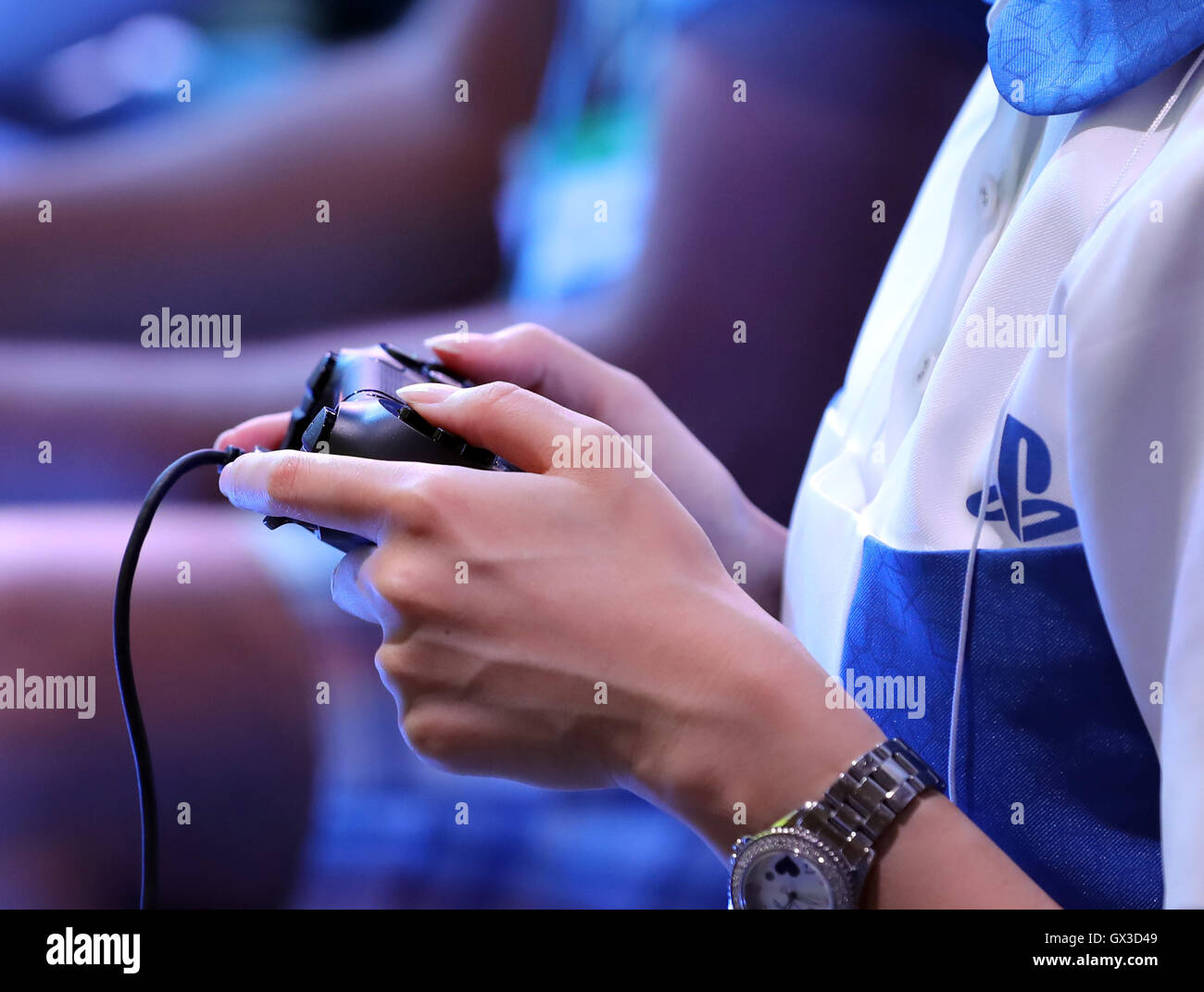 Thursday. 15th Sep, 2016. A visitor tries to play a videogame with Sony Interactive Entertainment's PlayStation 4 at the annual Tokyo Game Show in Chiba, suburban Tokyo on Thursday, September 15, 2016. The 20th anniversary Show includes show a new Virtual Reality (VR) area. The event hosts 614 exhibitors from 37 different countries and runs from September 15 to 18 at the International Convention Complex Makuhari Messe in Chiba. 1,523 game titles for smartphones, games consoles, PC and VR platforms are on show. Credit:  Yoshio Tsunoda/AFLO/Alamy Live News Stock Photo