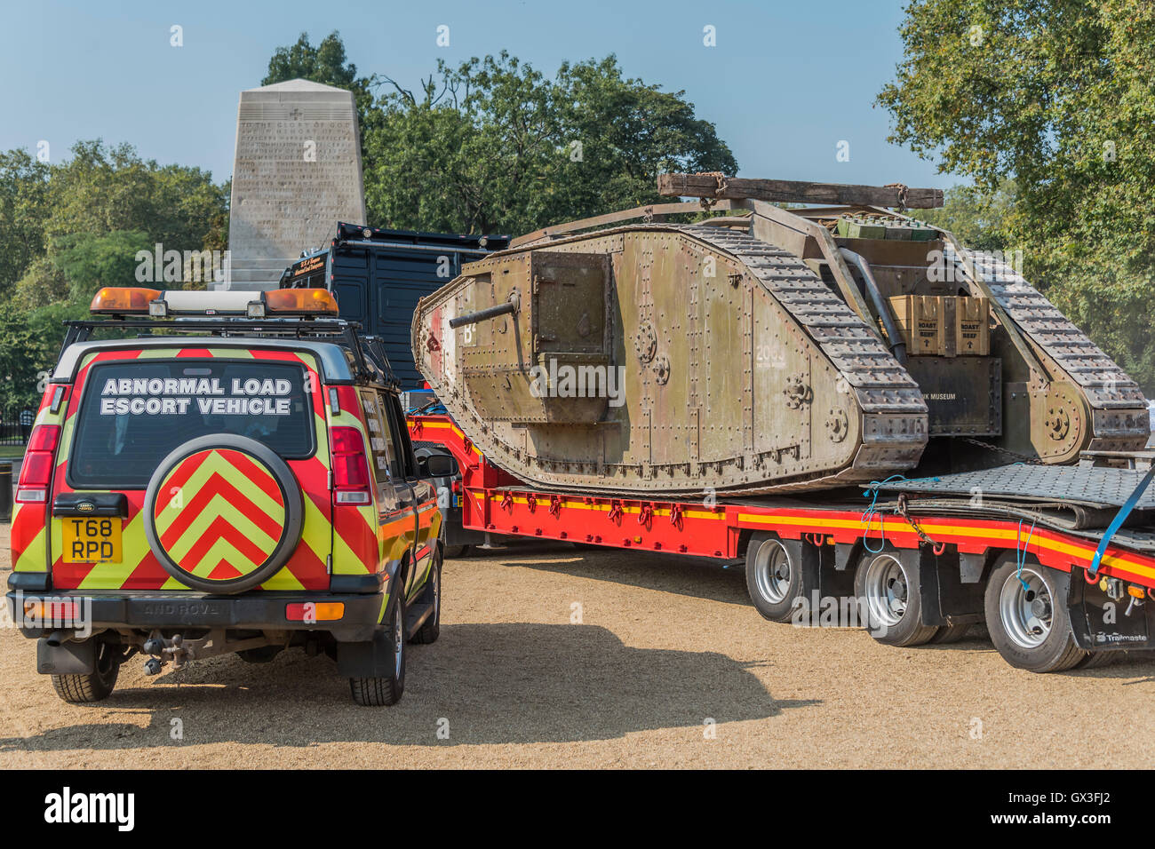 London, UK. 15th September, 2016. The tank is brought to Horse Guards Parade on a transporter on the short ride from Admiralty Arch to avoid damage to the road - A replica of a World War One tank brought to London to mark the 100th anniversary its first use in action in the Battle of the Somme on 15 September 1916. Dorset's Tank Museum, provided the machine which was designed to travel at walking pace (3mph) to support the infantry. Credit:  Guy Bell/Alamy Live News Stock Photo