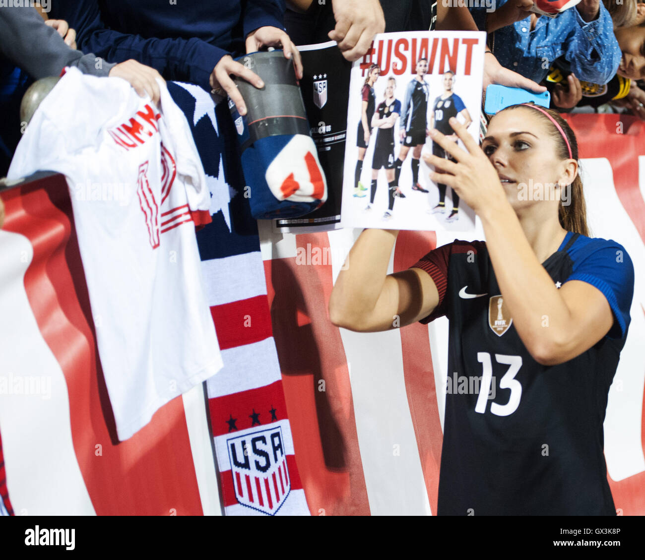 Columbus, U.S.A. 15th Sep, 2016. September 15, 2016: USA forward Alex Morgan signs autographs for fans after the 9-0 victory against Thailand on Thursday night. Columbus, OH, USA. Credit:  Brent Clark/Alamy Live News Stock Photo