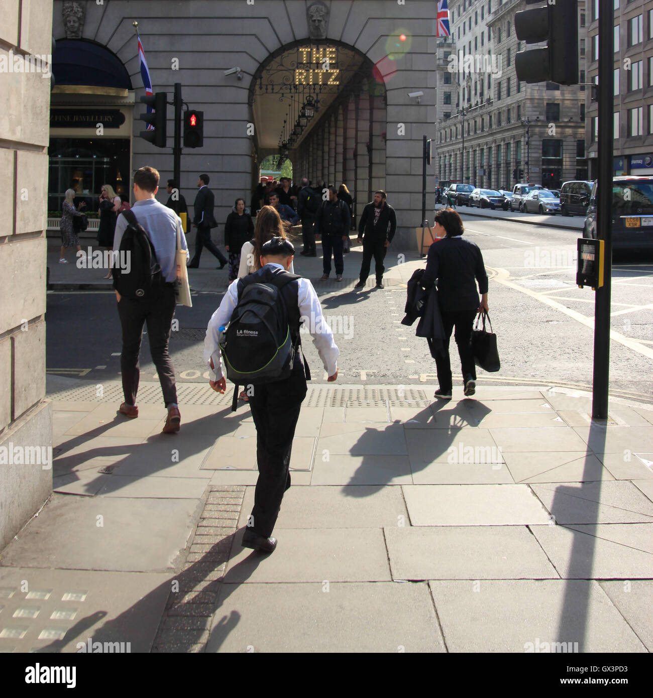 People on way home from work Piccadilly, London outside Ritz Hotel long ...