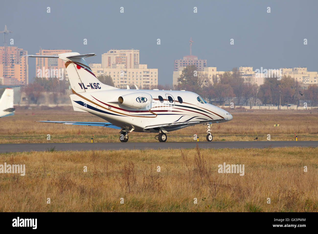 Kiev, Ukraine - November 5, 2011: Raytheon 390 Premier business jet is taking off from the airport Stock Photo