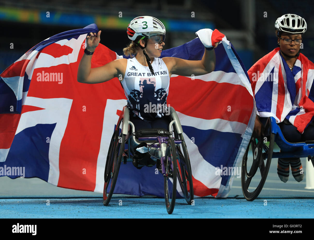 Great Britain's Hannah Cockroft (left) celebrates winning the Women's 400 metres T34 final alongside third placed Kare Adenegan at the Olympic Stadium during the seventh day of the 2016 Rio Paralympic Games in Rio de Janeiro, Brazil. Stock Photo