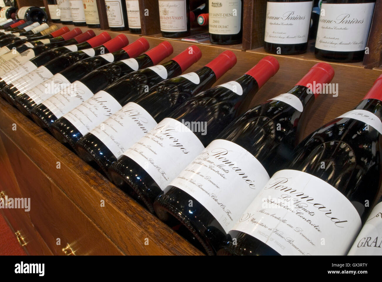 Variety of fine Burgundy wine bottles on display for sale at JeanLuc Aegerter wine shop, Beaune