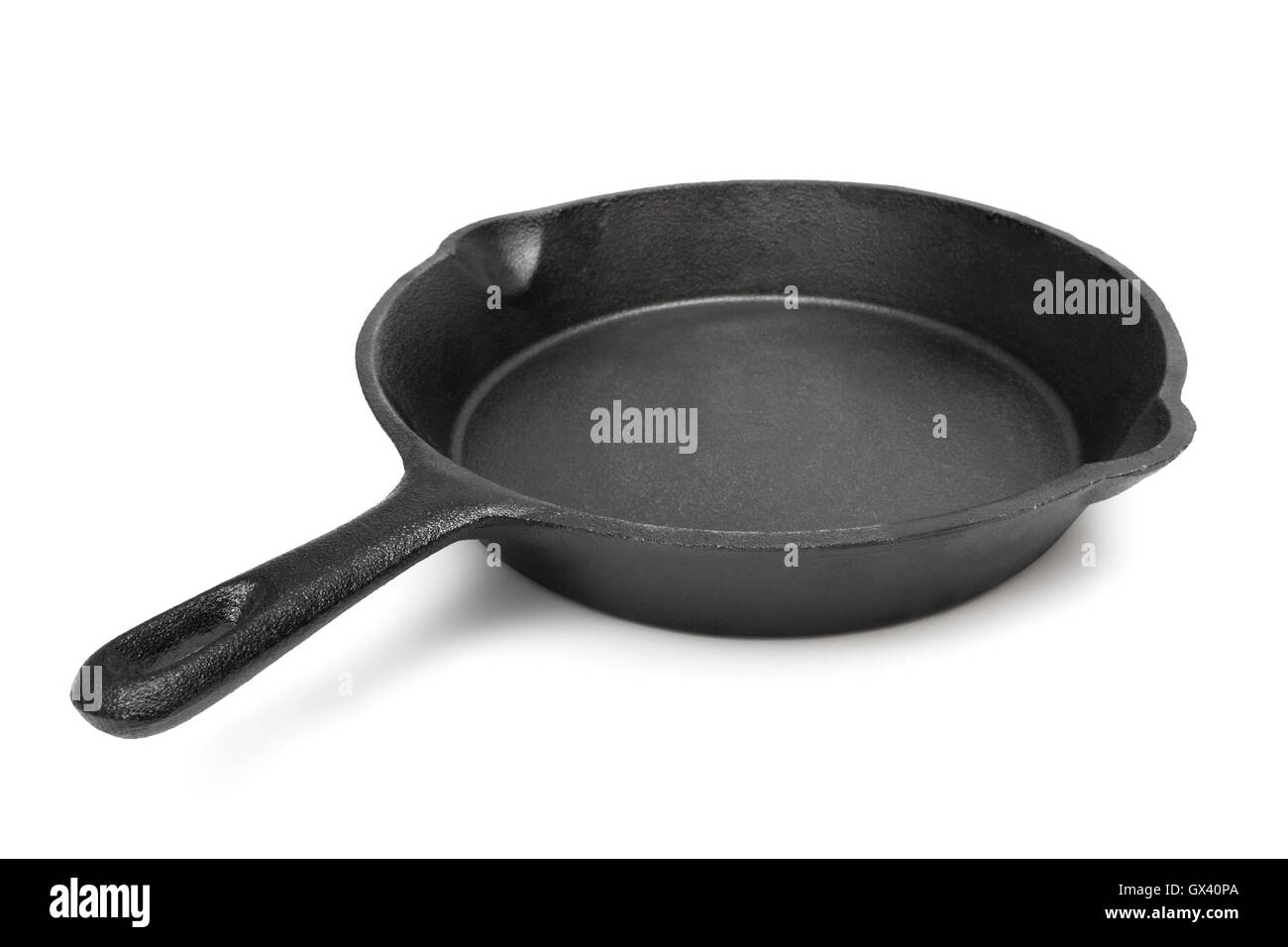 castiron frying pan on a white background Stock Photo Alamy