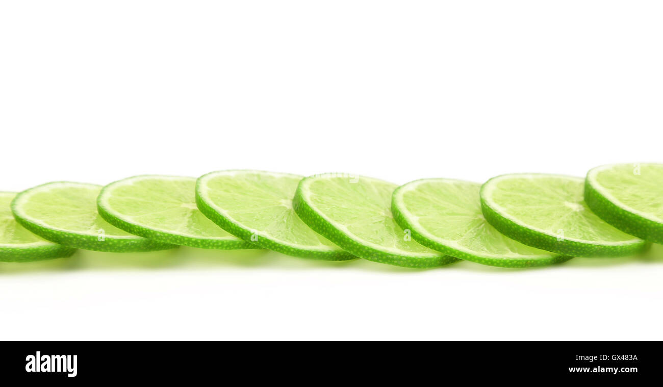 Slices of green lemon Stock Photo