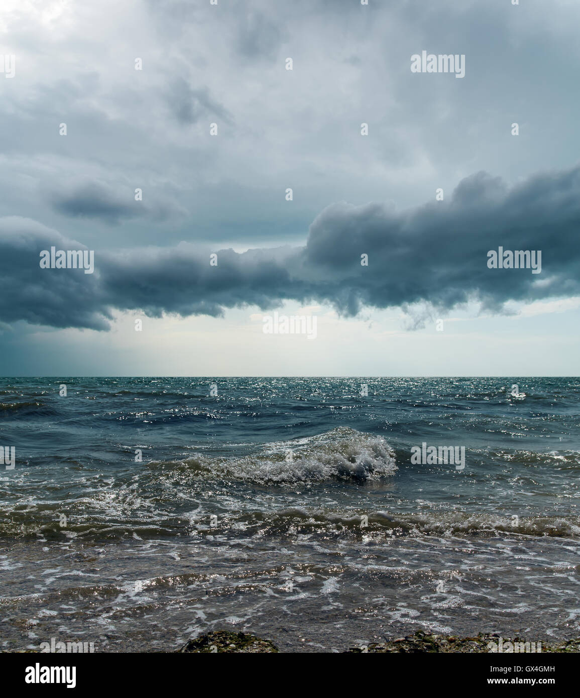 stormy sky over dark sea Stock Photo - Alamy