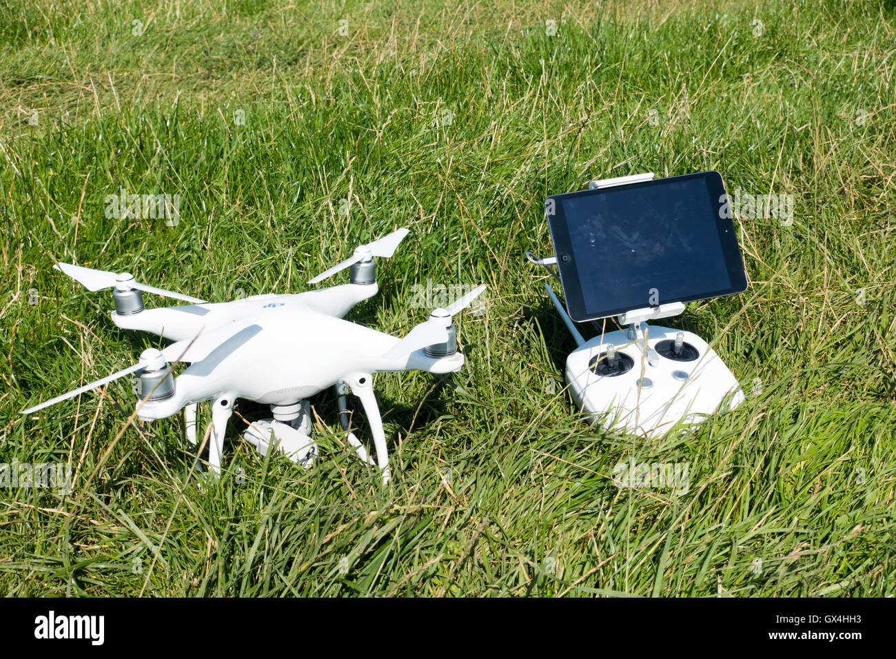 DJI Phantom 4 UAV Drone with controller and tablet Stock Photo