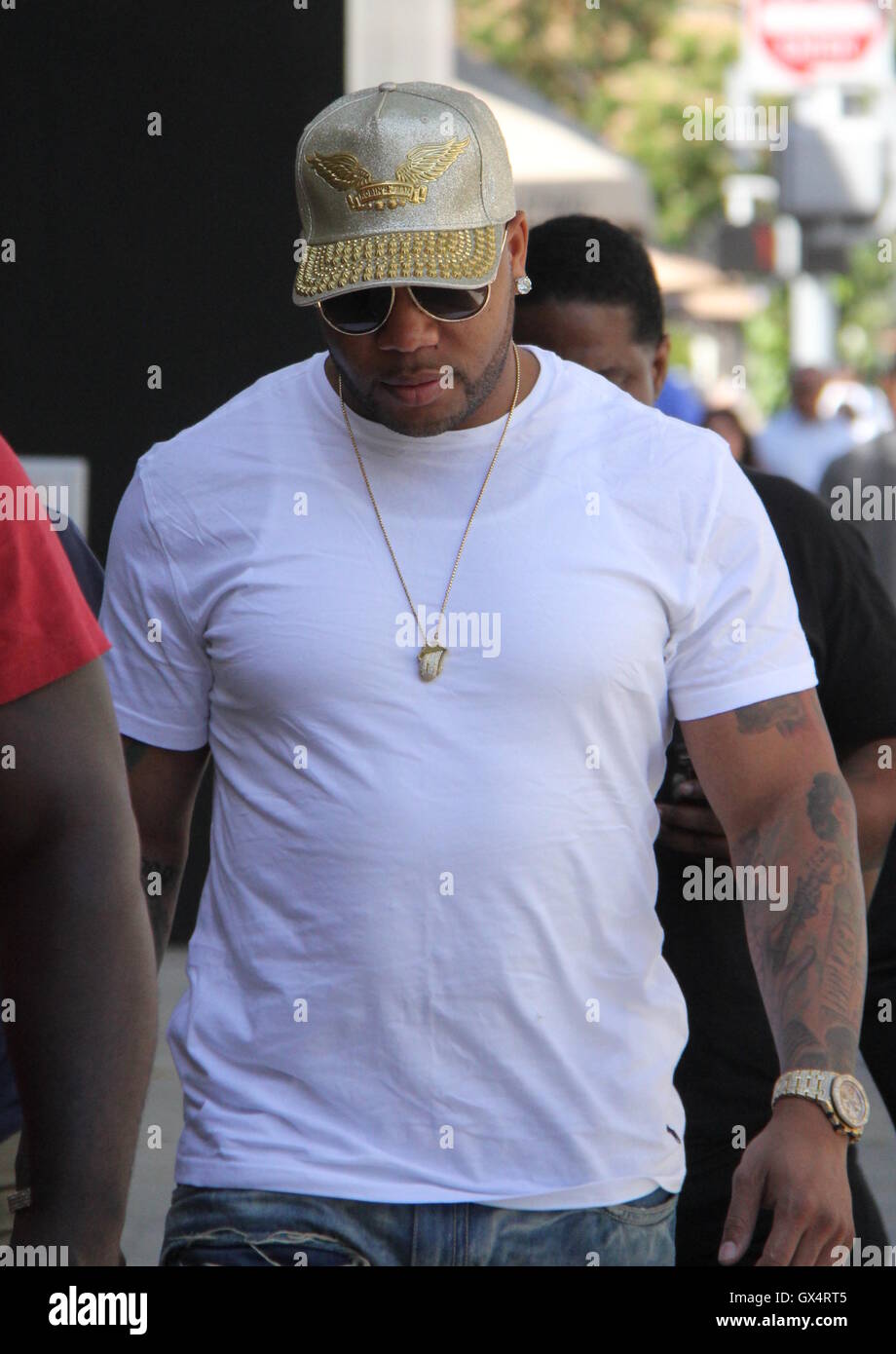 Flo Rida Body Guard Flo Rida out and about with his friends on a sunny day Featuring: flo ...