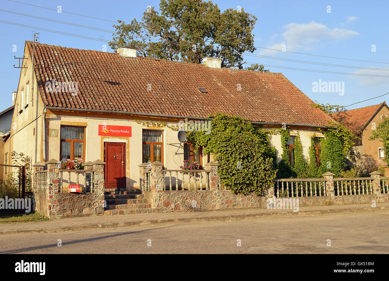 The post office in Zytkiejmy, Poland, close to the border with Russia's Kalingrad Oblast and formerly the village of Szittkehmen Stock Photo