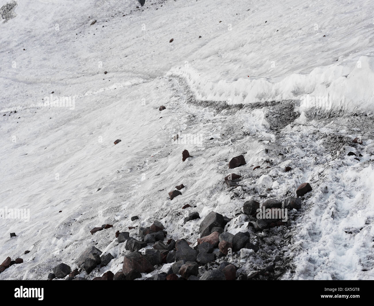 The snowy path marking the way to Mt. Rainier's summit Stock Photo