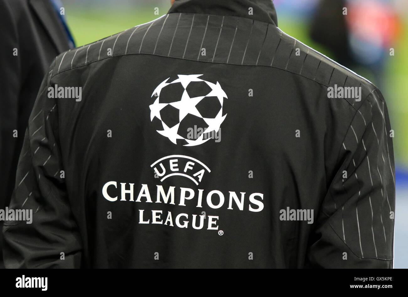 Official UEFA Champions League logo on the back of referee's jacket Stock Photo