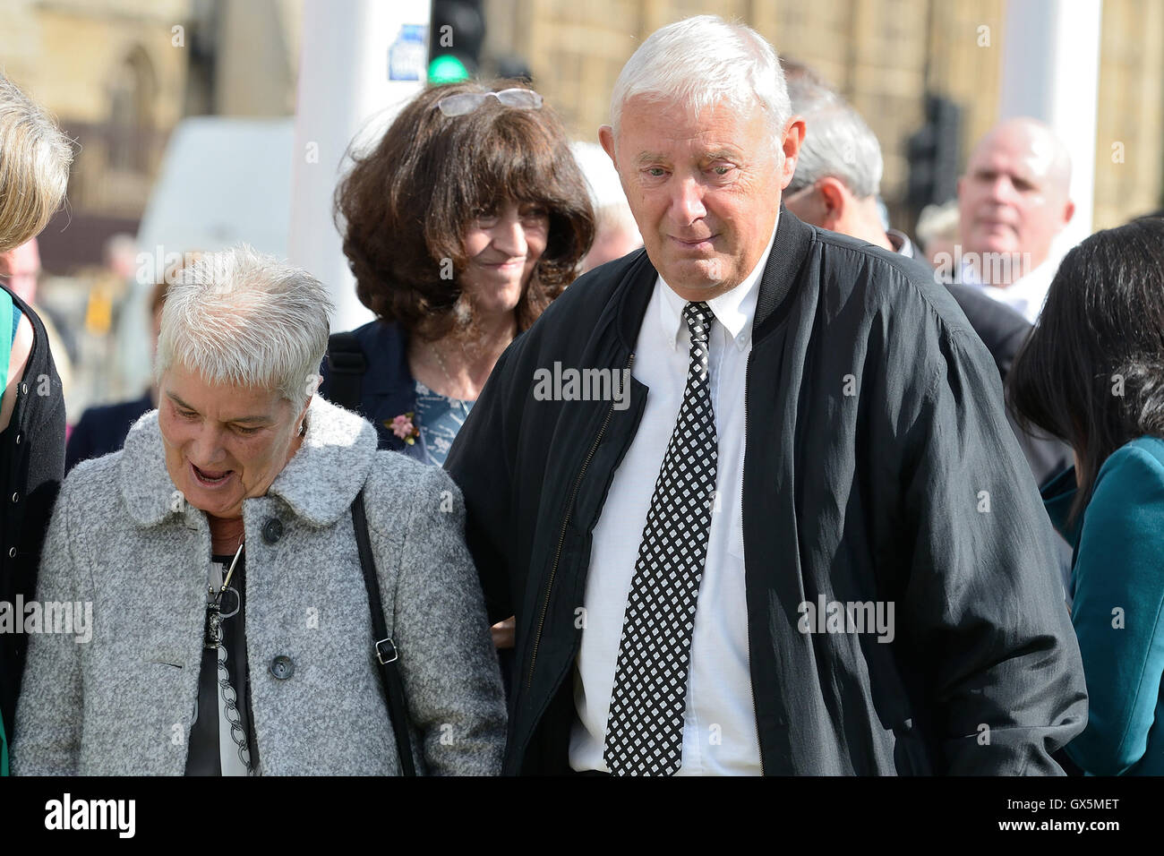 Gordon and Jean Leadbeater join MPs to view the floral display in