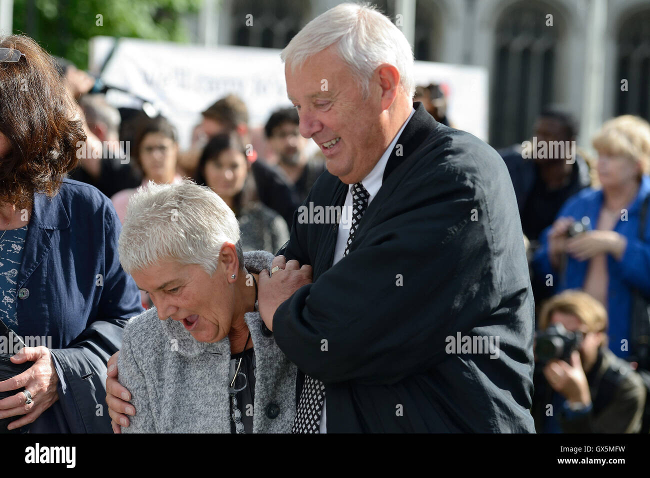 Gordon and Jean Leadbeater join MPs to view the floral display in