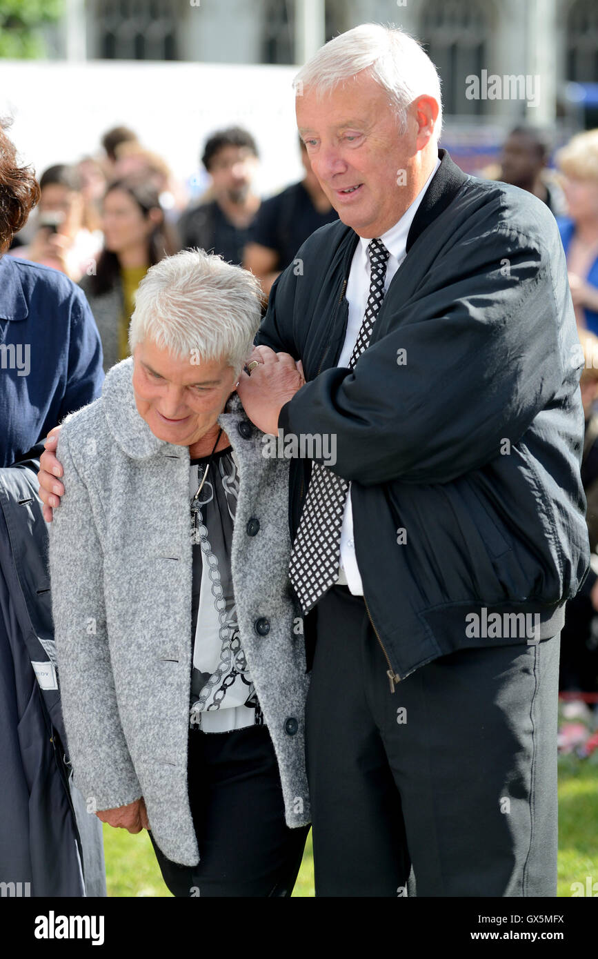 Gordon and Jean Leadbeater join MPs to view the floral display in