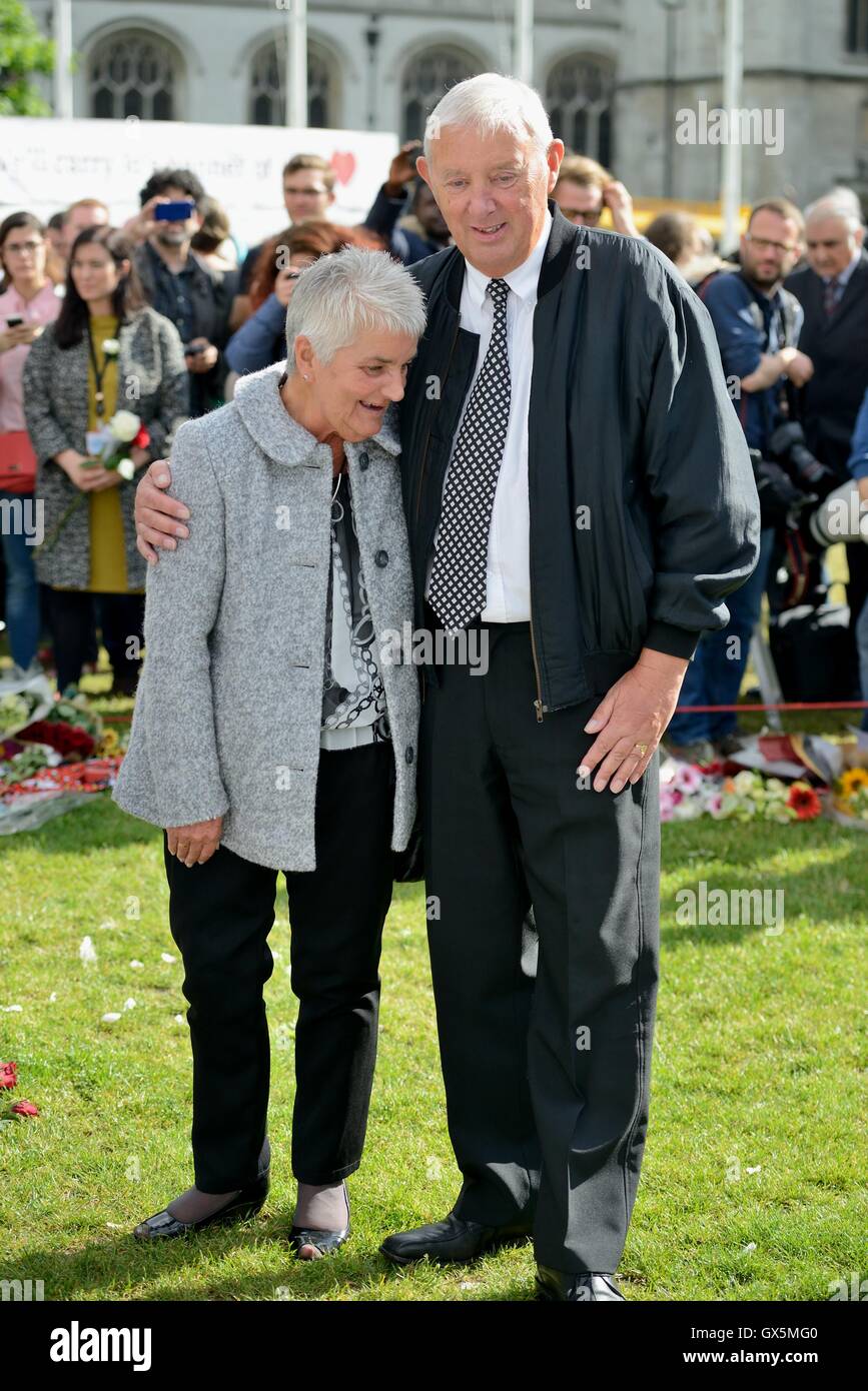 Gordon and Jean Leadbeater join MPs to view the floral display in