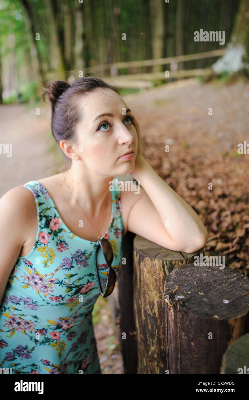 Young girl on a walk in the forest Stock Photo - Alamy
